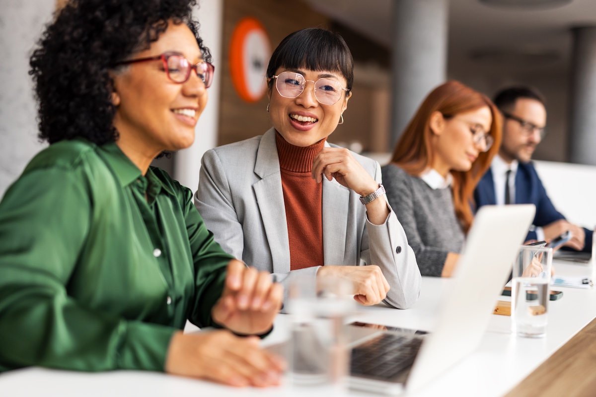 A,Dynamic,Workplace,Showing,Professionals,Collaborating,And,Engaged,In,Productive A dynamic workplace showing professionals collaborating and engaged in productive discussions in a modern setting