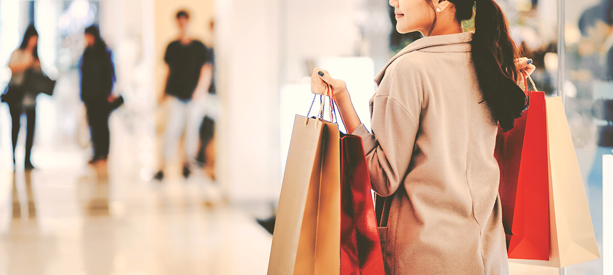 Woman shopping with bags in her hands